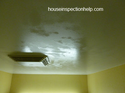 ceiling with drops of water in bathroom