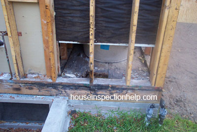 plywood water damage under bathtub