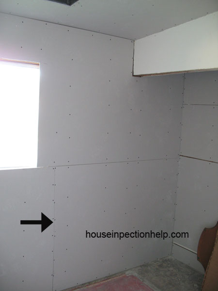 drwall hung and nailed in bedroom