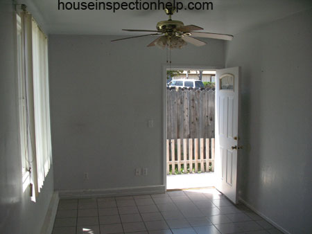 view from inside house of open door